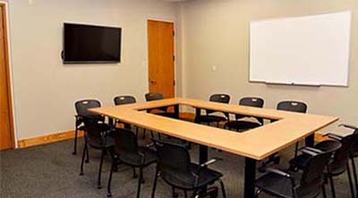 Sistema de conferência de Dante para pequena sala de negociação